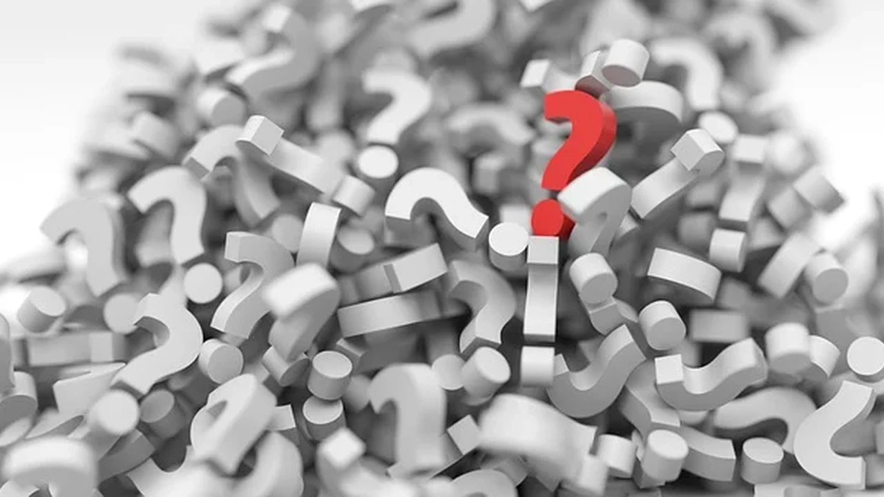 Close up on a plate of mashed potatoes, topped with baked pork chops with cream of mushroom soup, and a side of green beans.